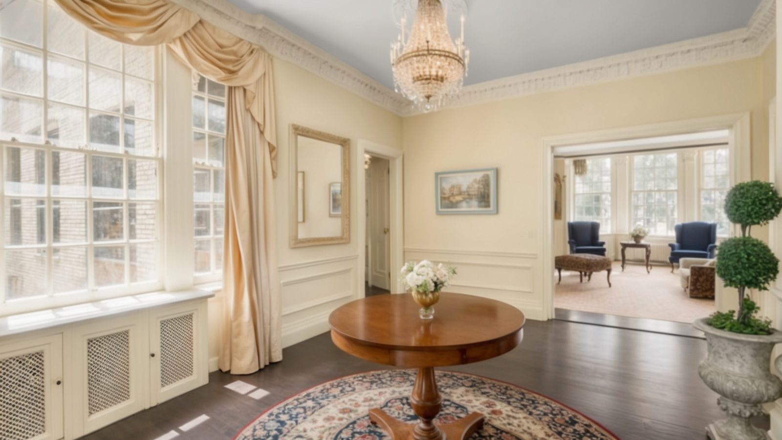 03 a bright, welcoming entrance with cream walls, polished floor
