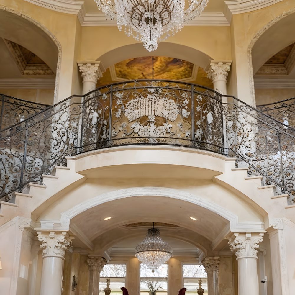 antonio brown%e2%80%99s grand foyer with spiral staircase