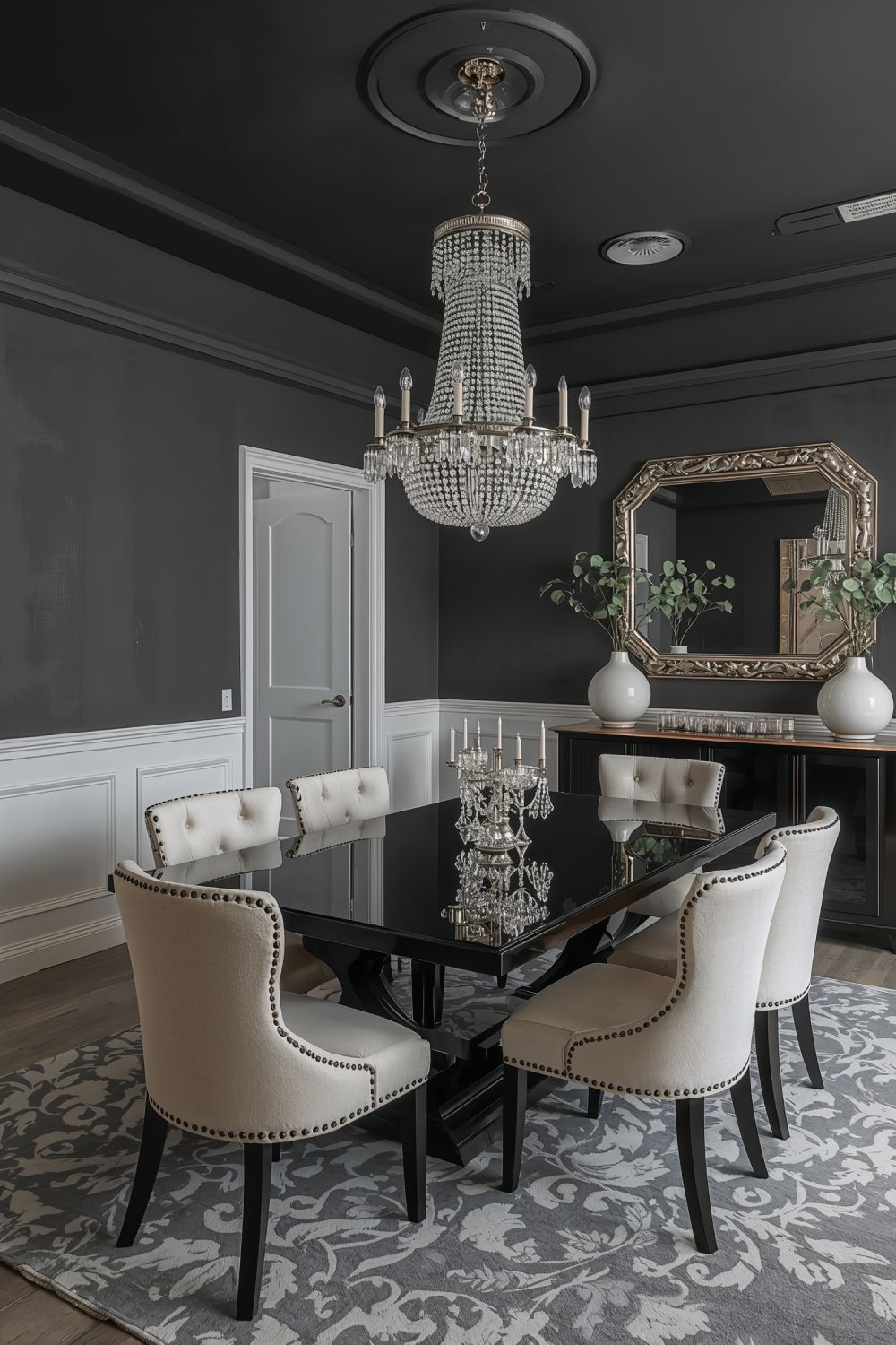 Charcoal Grey Moody Dining Room With Tiered Crystal Chandelier