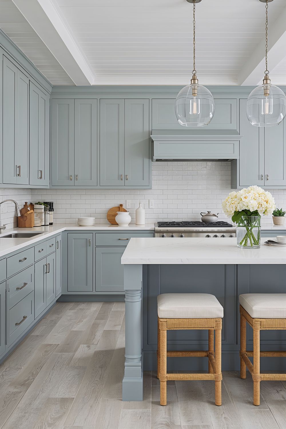 Coastal Blue Gray Aleutian Kitchen Cabinets With Brushed Nickel Hardware Against Agreeable Gray Walls