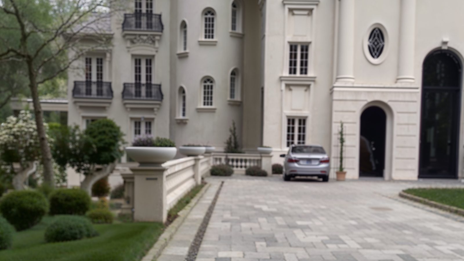 cobblestone driveway and secondary entrance