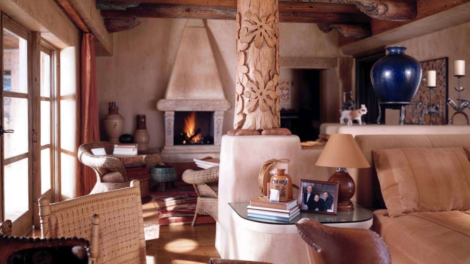 cozy master suite with adobe fireplace