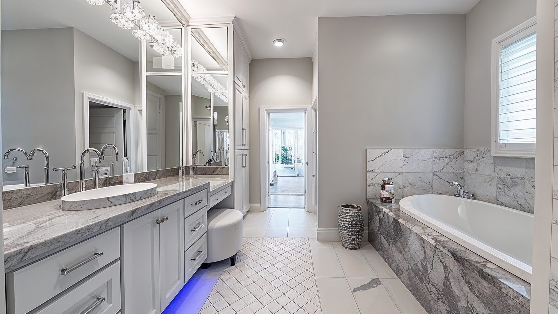 Elegant Marble Master Bathroom With LED Features