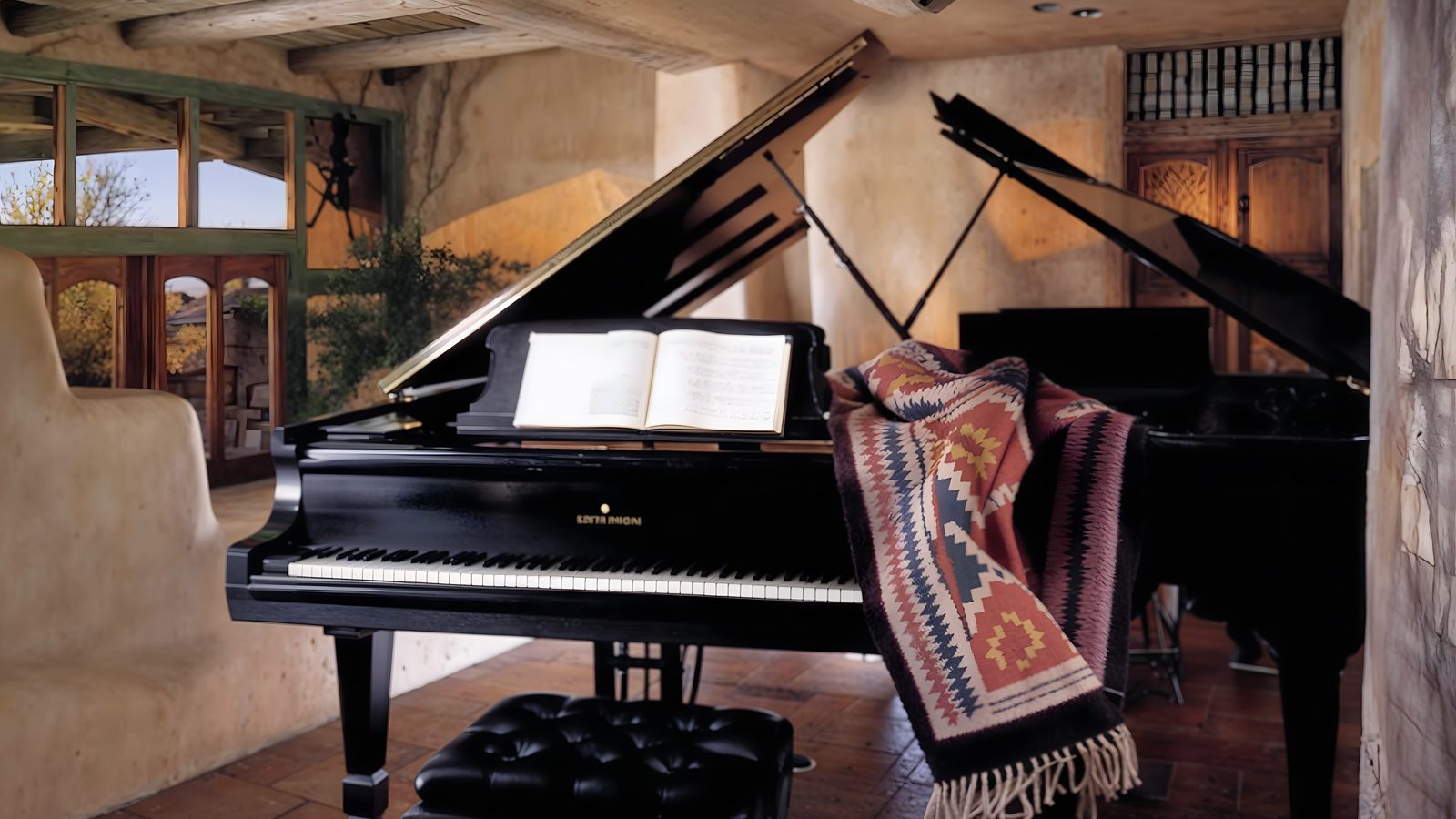 elegant music room with twin grand pianos