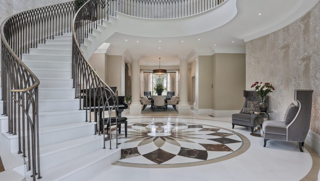 grand foyer with sweeping staircase
