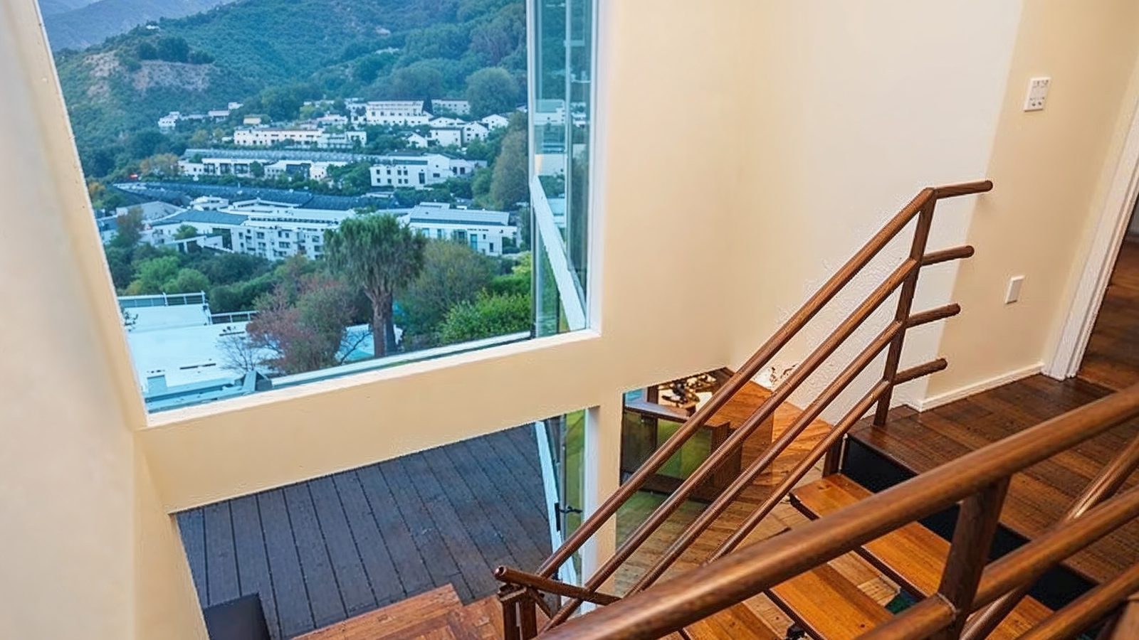 scenic staircase with panoramic view in pamela bach%e2%80%99s ho