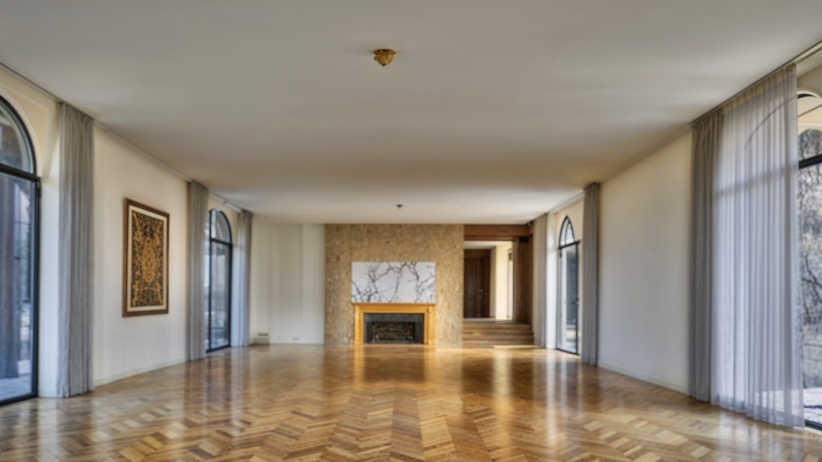 spacious living room with parquet flooring in walker mccune mans