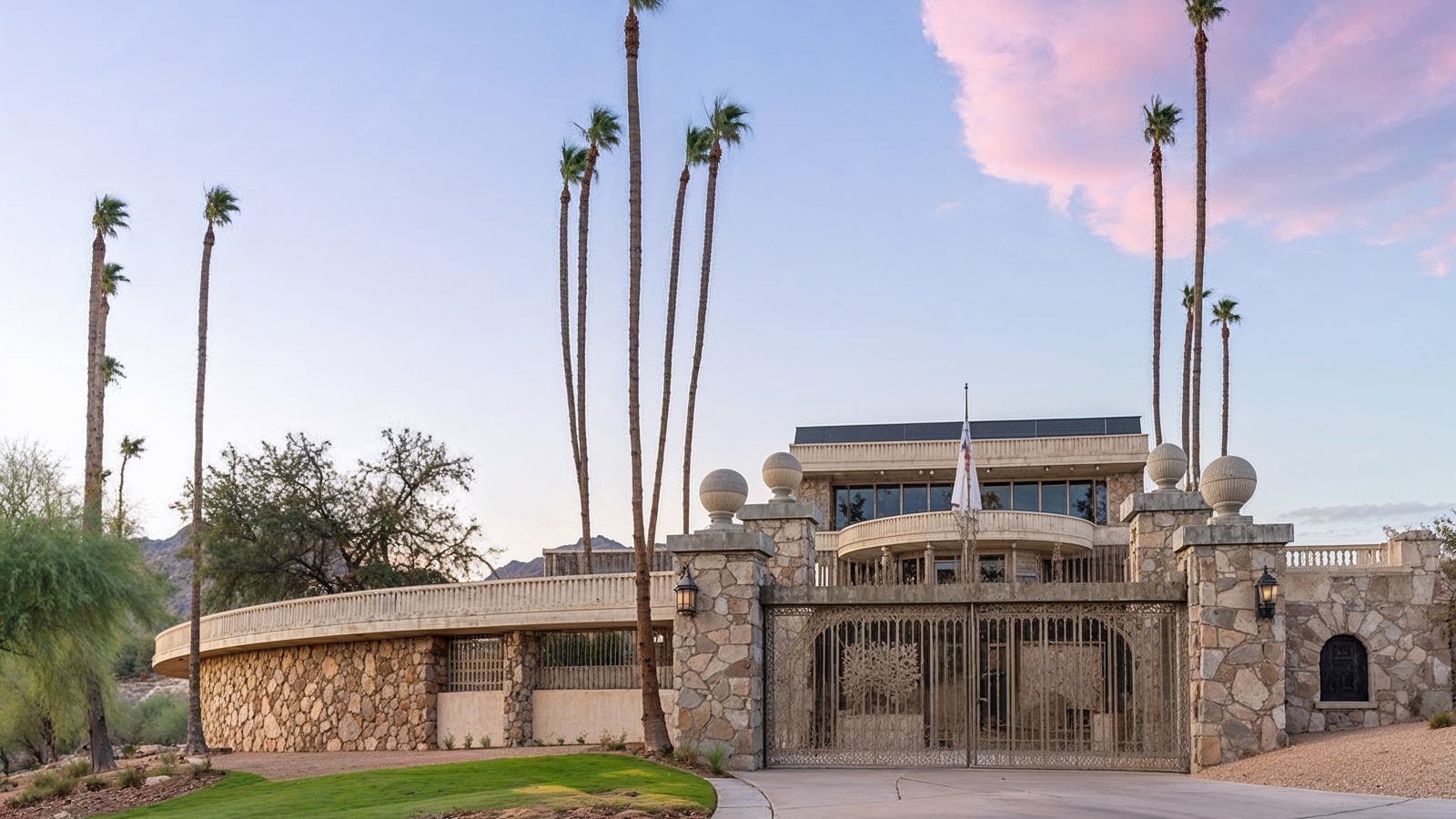 walker mccune mansion grand entrance with stone gateways